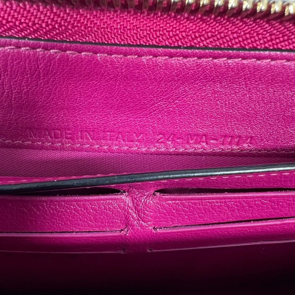 1009: Christian Dior Pebbled Leather Zip Continental Wallet, Fuchsia Int